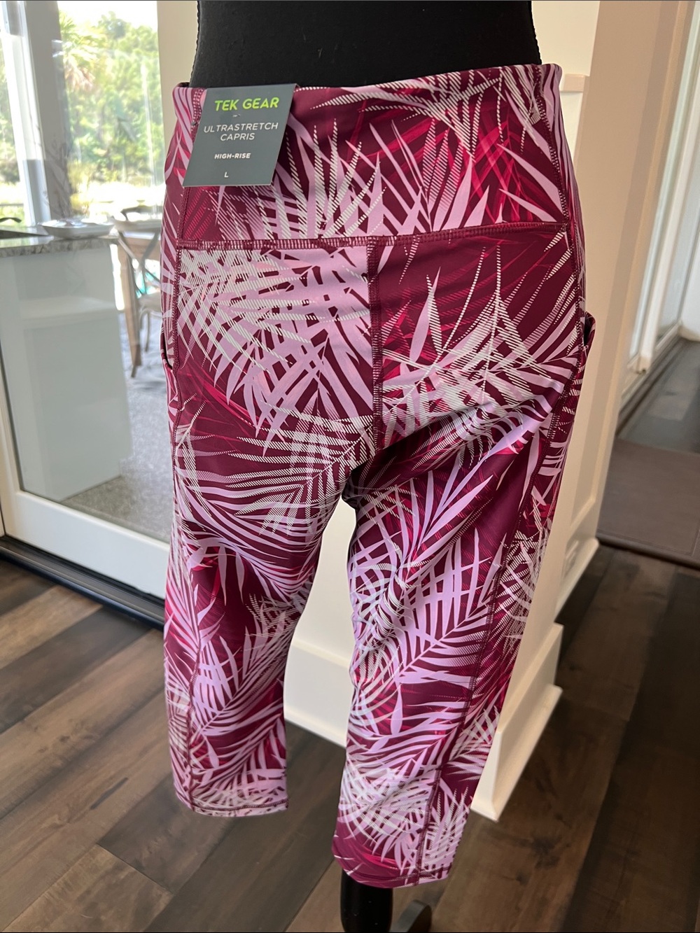 Double pocketed Tek Gear Pink and Burgundy Palm-Print Capri yoga pants - Picture 3 of 7